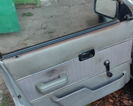 Серый Форд Эскорт, объемом двигателя 1.3 л и пробегом 180 тыс. км за 1417 $, фото 10 на Automoto.ua