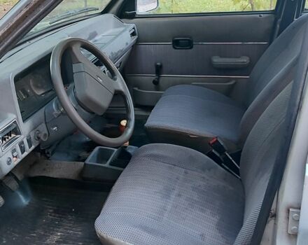 Серый Форд Эскорт, объемом двигателя 1.3 л и пробегом 180 тыс. км за 1417 $, фото 9 на Automoto.ua