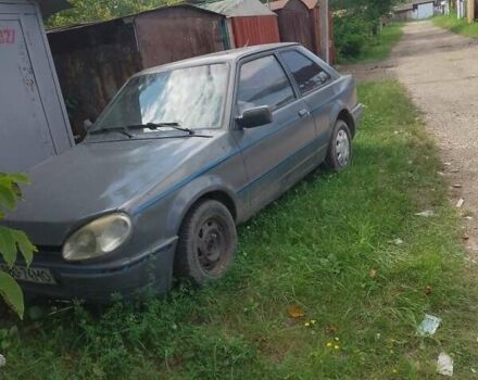 Сірий Форд Ескорт, об'ємом двигуна 1 л та пробігом 45 тис. км за 121 $, фото 1 на Automoto.ua
