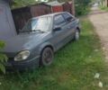 Сірий Форд Ескорт, об'ємом двигуна 1 л та пробігом 45 тис. км за 121 $, фото 1 на Automoto.ua