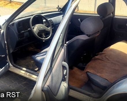 Серый Форд Эскорт, объемом двигателя 1.4 л и пробегом 540 тыс. км за 900 $, фото 4 на Automoto.ua