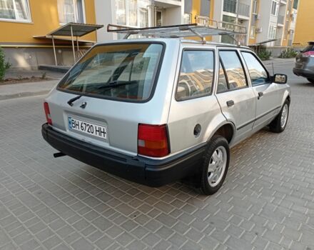 Сірий Форд Ескорт, об'ємом двигуна 1.4 л та пробігом 154 тис. км за 1250 $, фото 4 на Automoto.ua