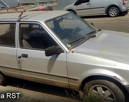 Серый Форд Эскорт, объемом двигателя 1.4 л и пробегом 540 тыс. км за 900 $, фото 11 на Automoto.ua