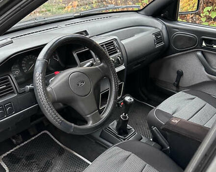 Сірий Форд Ескорт, об'ємом двигуна 1.8 л та пробігом 350 тис. км за 2700 $, фото 10 на Automoto.ua