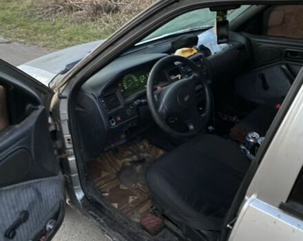 Серый Форд Эскорт, объемом двигателя 1.8 л и пробегом 9 тыс. км за 782 $, фото 4 на Automoto.ua