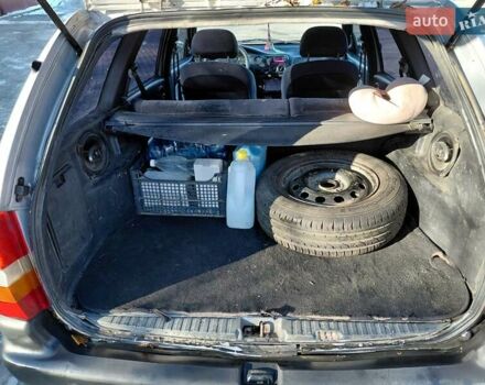 Сірий Форд Ескорт, об'ємом двигуна 1.8 л та пробігом 289 тис. км за 1000 $, фото 16 на Automoto.ua