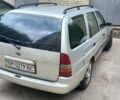 Серый Форд Эскорт, объемом двигателя 1.6 л и пробегом 366 тыс. км за 1453 $, фото 1 на Automoto.ua