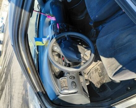 Сірий Форд Ескорт, об'ємом двигуна 1.8 л та пробігом 289 тис. км за 1000 $, фото 11 на Automoto.ua