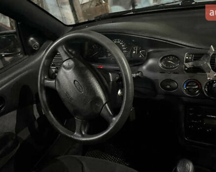 Серый Форд Эскорт, объемом двигателя 1.6 л и пробегом 602 тыс. км за 3000 $, фото 11 на Automoto.ua