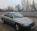 Сірий Форд Ескорт, об'ємом двигуна 1.3 л та пробігом 300 тис. км за 809 $, фото 1 на Automoto.ua