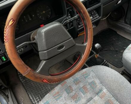 Серый Форд Эскорт, объемом двигателя 1.1 л и пробегом 360 тыс. км за 500 $, фото 3 на Automoto.ua