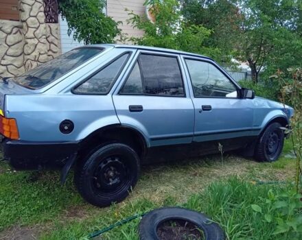 Сірий Форд Ескорт, об'ємом двигуна 1 л та пробігом 3 тис. км за 345 $, фото 1 на Automoto.ua