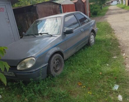 Сірий Форд Ескорт, об'ємом двигуна 1 л та пробігом 45 тис. км за 121 $, фото 1 на Automoto.ua
