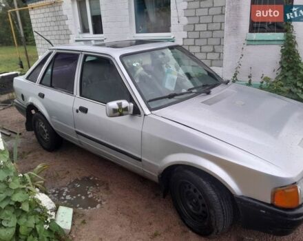 Серый Форд Эскорт, объемом двигателя 1.4 л и пробегом 354 тыс. км за 1000 $, фото 1 на Automoto.ua