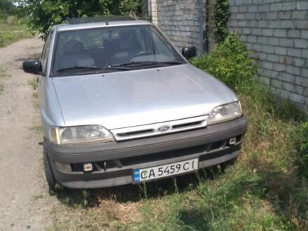 Серый Форд Эскорт, объемом двигателя 1.6 л и пробегом 200 тыс. км за 500 $, фото 1 на Automoto.ua