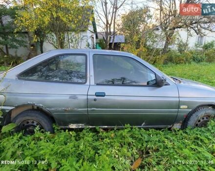 Серый Форд Эскорт, объемом двигателя 1.8 л и пробегом 320 тыс. км за 850 $, фото 1 на Automoto.ua