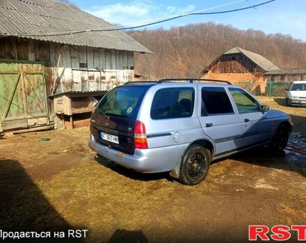 Сірий Форд Ескорт, об'ємом двигуна 1.4 л та пробігом 250 тис. км за 750 $, фото 1 на Automoto.ua