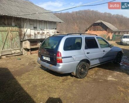 Сірий Форд Ескорт, об'ємом двигуна 1.39 л та пробігом 100 тис. км за 750 $, фото 1 на Automoto.ua