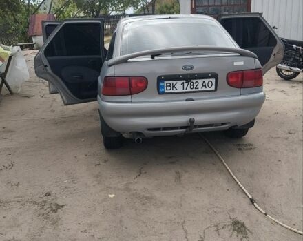 Серый Форд Эскорт, объемом двигателя 1.8 л и пробегом 239 тыс. км за 1300 $, фото 1 на Automoto.ua