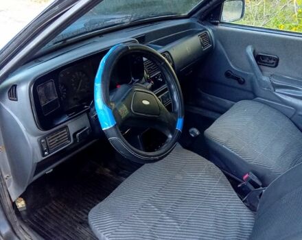 Синий Форд Эскорт, объемом двигателя 1.4 л и пробегом 215 тыс. км за 600 $, фото 4 на Automoto.ua