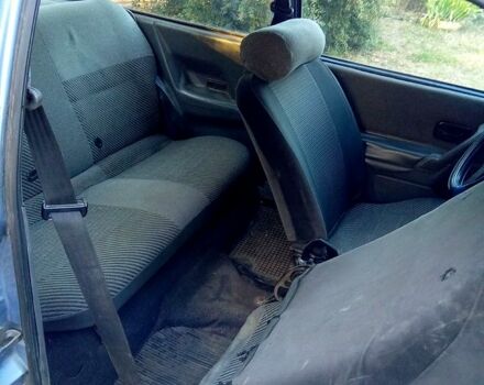 Синий Форд Эскорт, объемом двигателя 1.4 л и пробегом 215 тыс. км за 600 $, фото 5 на Automoto.ua