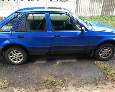 Синий Форд Эскорт, объемом двигателя 1.4 л и пробегом 400 тыс. км за 990 $, фото 4 на Automoto.ua