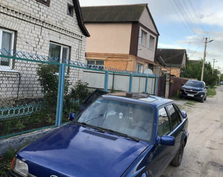 Синий Форд Эскорт, объемом двигателя 1.4 л и пробегом 117 тыс. км за 1100 $, фото 2 на Automoto.ua