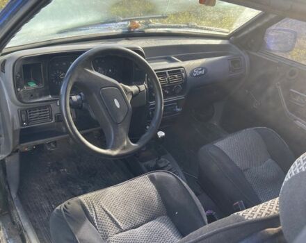 Синий Форд Эскорт, объемом двигателя 1.4 л и пробегом 250 тыс. км за 650 $, фото 1 на Automoto.ua