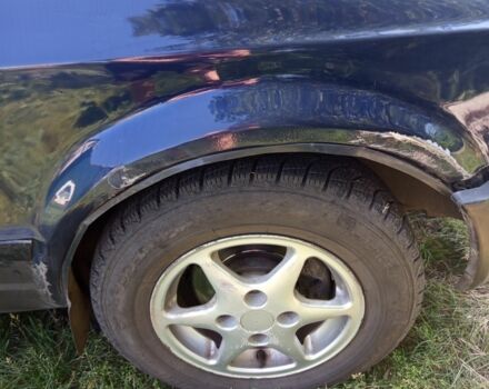 Синий Форд Эскорт, объемом двигателя 1.4 л и пробегом 777 тыс. км за 608 $, фото 6 на Automoto.ua