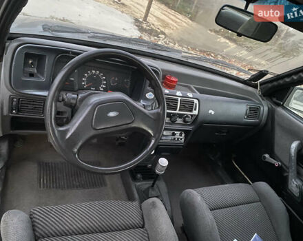 Синий Форд Эскорт, объемом двигателя 1.4 л и пробегом 210 тыс. км за 750 $, фото 4 на Automoto.ua