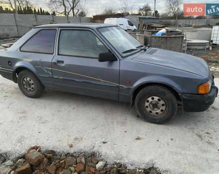 Синий Форд Эскорт, объемом двигателя 1.4 л и пробегом 210 тыс. км за 750 $, фото 5 на Automoto.ua