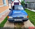 Синий Форд Эскорт, объемом двигателя 1.4 л и пробегом 110 тыс. км за 600 $, фото 1 на Automoto.ua