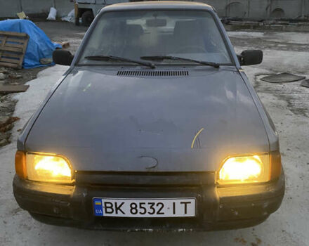 Синий Форд Эскорт, объемом двигателя 1.4 л и пробегом 210 тыс. км за 750 $, фото 1 на Automoto.ua