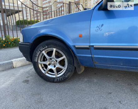 Синий Форд Эскорт, объемом двигателя 1.4 л и пробегом 99 тыс. км за 1250 $, фото 1 на Automoto.ua