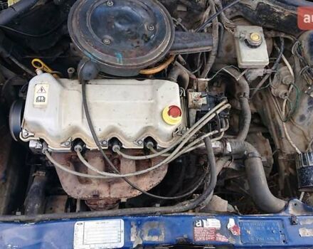 Синий Форд Эскорт, объемом двигателя 1.4 л и пробегом 500 тыс. км за 600 $, фото 5 на Automoto.ua