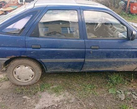 Синий Форд Эскорт, объемом двигателя 1.4 л и пробегом 500 тыс. км за 600 $, фото 1 на Automoto.ua