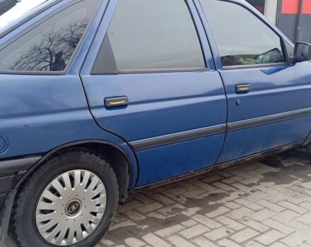 Синий Форд Эскорт, объемом двигателя 1.3 л и пробегом 300 тыс. км за 1300 $, фото 1 на Automoto.ua