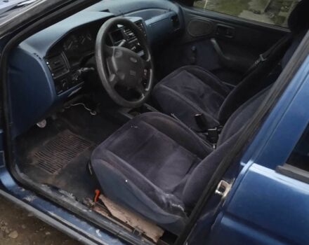 Синий Форд Эскорт, объемом двигателя 1.6 л и пробегом 280 тыс. км за 309 $, фото 4 на Automoto.ua