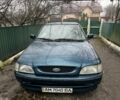 Синий Форд Эскорт, объемом двигателя 1.6 л и пробегом 93 тыс. км за 800 $, фото 1 на Automoto.ua