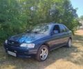 Синий Форд Эскорт, объемом двигателя 1.4 л и пробегом 76 тыс. км за 3000 $, фото 1 на Automoto.ua