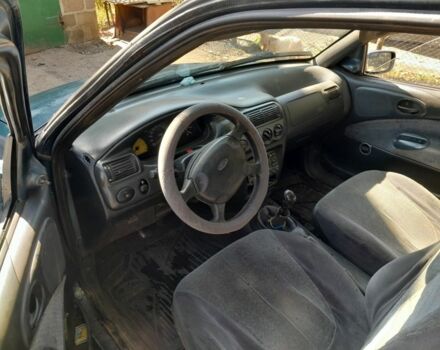 Синий Форд Эскорт, объемом двигателя 1.6 л и пробегом 1000 тыс. км за 671 $, фото 3 на Automoto.ua