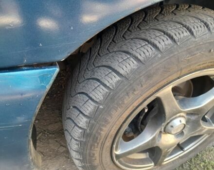 Синий Форд Эскорт, объемом двигателя 1.6 л и пробегом 1000 тыс. км за 671 $, фото 4 на Automoto.ua