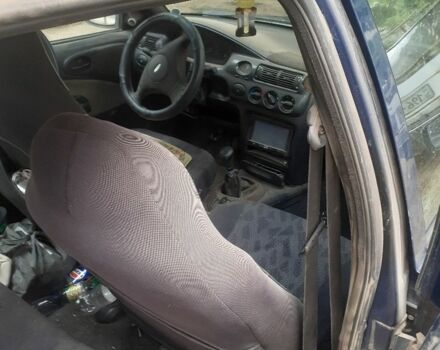 Синий Форд Эскорт, объемом двигателя 1.6 л и пробегом 12 тыс. км за 600 $, фото 4 на Automoto.ua