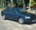 Синий Форд Эскорт, объемом двигателя 1.4 л и пробегом 98 тыс. км за 1650 $, фото 1 на Automoto.ua