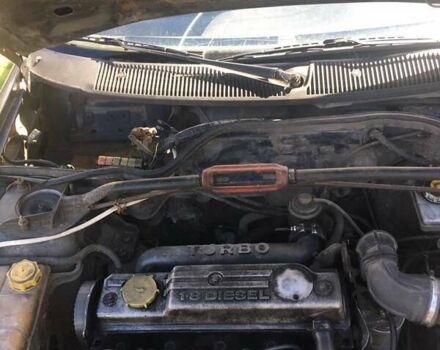 Синий Форд Эскорт, объемом двигателя 1.8 л и пробегом 400 тыс. км за 900 $, фото 7 на Automoto.ua