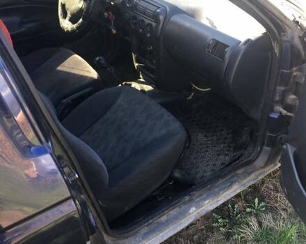 Синий Форд Эскорт, объемом двигателя 1.8 л и пробегом 400 тыс. км за 900 $, фото 5 на Automoto.ua