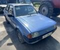 Синий Форд Эскорт, объемом двигателя 1.4 л и пробегом 150 тыс. км за 650 $, фото 1 на Automoto.ua
