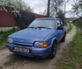 Синий Форд Эскорт, объемом двигателя 1.4 л и пробегом 199 тыс. км за 1000 $, фото 1 на Automoto.ua