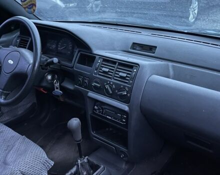 Синий Форд Эскорт, объемом двигателя 1.4 л и пробегом 136 тыс. км за 400 $, фото 7 на Automoto.ua