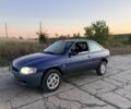 Синий Форд Эскорт, объемом двигателя 1.8 л и пробегом 180 тыс. км за 671 $, фото 1 на Automoto.ua